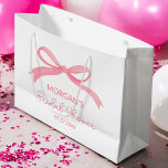 She's Tying The Knot Pink Bow Bridal Shower Large Gift Bag<br><div class="desc">Celebrate the bride-to-be with the "She's Tying The Knot" Pink Bow Bridal Shower Large Gift Bag. This lovely bag features a delicate pink bow design, adding an elegant touch to any bridal shower. Perfect for holding small gifts, treats, or party favors, this bag is both stylish and practical. Its soft...</div>