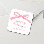 She's Tying The Knot Pink Bow Bridal Shower Square Sticker<br><div class="desc">Celebrate the bride-to-be with our "She's Tying The Knot" Pink Bow Bridal Shower Classic Sticker. Featuring a soft blush pink background and an elegant bow design, these stickers add a charming touch to any bridal shower. Perfect for sealing invitations, embellishing favor bags, or decorating party accessories, they offer a stylish...</div>