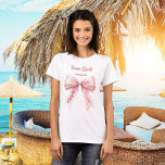 She's tying the knot pink bow Team Bride T-Shirt<br><div class="desc">White t-shirt decorated with a pink colored bow. Personalize and add a name.
Text: Team Bride.  She's tying the knot.</div>