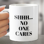 SHHH... No One Cares Coffee Mug<br><div class="desc">If you need your coffee first, this cup is for you! SHHHH... NO ONE CARES printed on both sides. Choose your mug style, handle color, inside color and change the background color to anything. Perfect for birthday gift, mother's day gift, father's day gift, co-worker gift, Christmas gift, gift for your...</div>