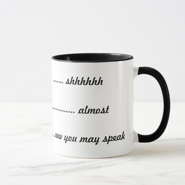 ----  shhhhh, -----almost, ----now you can speak mug (Right)
