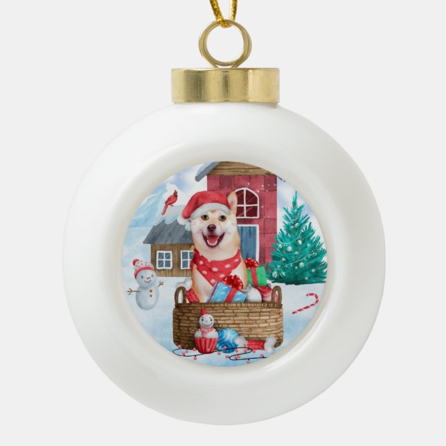 Shiba Inu Dog In snow Christmas Dog House Ceramic Ball Christmas Ornament (Front)
