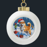 Shiba Inu Running in Snow with Christmas Hat Ceramic Ball Christmas Ornament<br><div class="desc">A spirited Shiba Inu runs joyfully through the snowy winter scene,  wearing a festive red Christmas hat. This charming design highlights the breed’s foxlike face,  curled tail,  and confident personality while capturing the warmth and joy of the holiday season. A delightful winter moment full of festive cheer.</div>