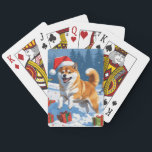 Shiba Inu Running in Snow with Christmas Hat Poker Cards<br><div class="desc">A spirited Shiba Inu runs joyfully through the snowy winter scene,  wearing a festive red Christmas hat. This charming design highlights the breed’s foxlike face,  curled tail,  and confident personality while capturing the warmth and joy of the holiday season. A delightful winter moment full of festive cheer.</div>
