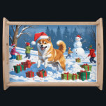 Shiba Inu Running in Snow with Christmas Hat Serving Tray<br><div class="desc">A spirited Shiba Inu runs joyfully through the snowy winter scene,  wearing a festive red Christmas hat. This charming design highlights the breed’s foxlike face,  curled tail,  and confident personality while capturing the warmth and joy of the holiday season. A delightful winter moment full of festive cheer.</div>