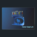 Shiny Blue Chanukkah Menorah Placemat<br><div class="desc">On the front a modernistic, metallic, blue Chanukkah menorah, featuring a lion in silhouette, against a dark, night-like background. All nine of the candles are lit. Hebrew text reading "Chag Chanukkah Sameach" (Happy Hanukkah) also appears in glowing blue and white. On the reverse side is the same image with a...</div>
