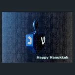 Shiny Blue Dreidel Cutting Board<br><div class="desc">A modernistic,  metallic blue dreidel against a dark,  night-like background.  Two of the Hebrew letters found on a dreidel,  nun and shin,  glow brightly.  Text reading "Happy Hanukkah" also appears in glowing blue and white.</div>