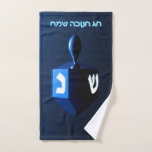 Shiny Blue Dreidel Hand Towel<br><div class="desc">A modernistic,  metallic,  blue dreidel against a dark,  night-like background.  Two of the Hebrew letters found on a dreidel,  nun and shin,  glow brightly.  Hebrew text reading "Chag Chanukkah Sameach" (Happy Hanukkah) also appears in glowing blue and white.</div>