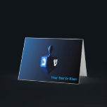 Shiny Blue Dreidel Holiday Card<br><div class="desc">A modernistic,  metallic,  blue dreidel against a dark,  night-like background.  Two of the Hebrew letters found on a dreidel,  nun and shin,  glow brightly. Add  your own text.</div>