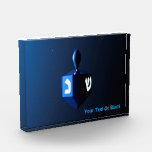 Shiny Blue Dreidel Photo Block<br><div class="desc">A modernistic,  metallic,  blue dreidel against a dark,  night-like background.  Two of the Hebrew letters found on a dreidel,  nun and shin,  glow brightly. Add  your own text.</div>