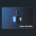Shiny Blue Dreidel Placemat<br><div class="desc">On the front a modernistic, metallic blue dreidel against a dark, night-like background. Two of the Hebrew letters found on a dreidel, nun and shin, glow brightly. Text reading "Happy Hanukkah" also appears in glowing blue and white. On the reverse side is the same image with a place for you...</div>