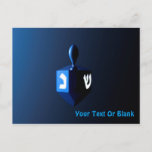 Shiny Blue Dreidel Postcard<br><div class="desc">A modernistic,  metallic blue dreidel against a dark,  night-like background.  Two of the Hebrew letters found on a dreidel,  nun and shin,  glow brightly.  Add your own text.</div>