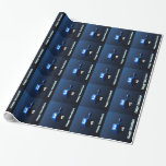 Shiny Blue Dreidel Wrapping Paper<br><div class="desc">A modernistic,  metallic blue dreidel against a dark,  night-like background.  Two of the Hebrew letters found on a dreidel,  nun and shin,  glow brightly.  Text reading "Happy Hanukkah" also appears in glowing blue and white.</div>