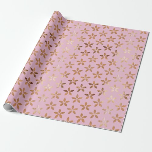shiny gold daisy pattern on blush pink wrapping paper