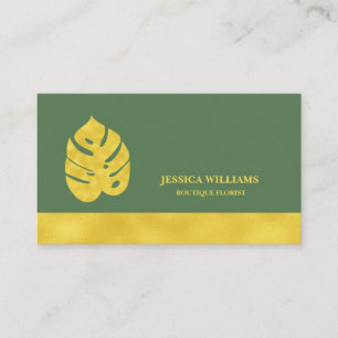 Shiny Golden Monstera leaves on dark green Business Card