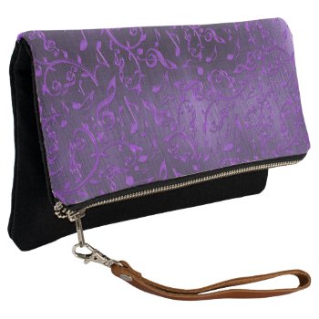 Shiny Purple Music Notes On Black Clutch Purse Bag by UROCKDezineZone at Zazzle