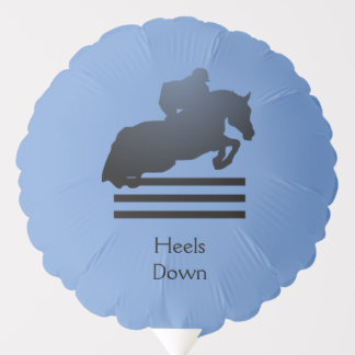 Show jumper clearing an obstacle. Balloon