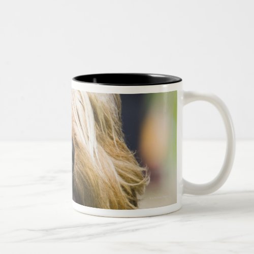 showing tongue long hair portrait Two_Tone coffee mug