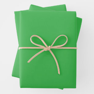 shows green vinyl wrap in two views wrapping paper sheets