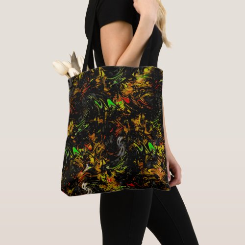 Showy colorful spots wrapped by flashy black       tote bag