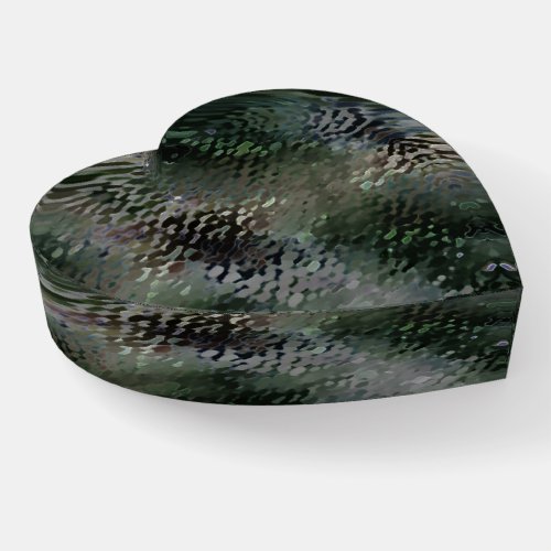 Showy scaly plaques floating over dark fund paperweight