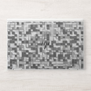 Shuffled small squares in tones of grey to clear HP laptop skin