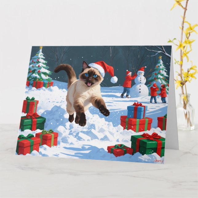 Siamese Cat Running in Snow with Christmas Hat Card (Yellow Flower)