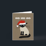 Siamese Santa Clause - Funny Kitty Cat Christmas Holiday Card<br><div class="desc">Ho Ho Ho. Funny Siamese cat wearing a Santa Clause hat. This annoyed kitty says Bah Humbug to wearing a ridiculous hat. This funny Christmas card can be personalized with your own greeting. A fun cat lover’s holiday card purrfect for both personal and business holiday mailings. Great for pet sitters,...</div>