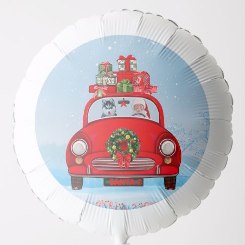 Siberian Husky Dog In Car With Santa Claus Balloon