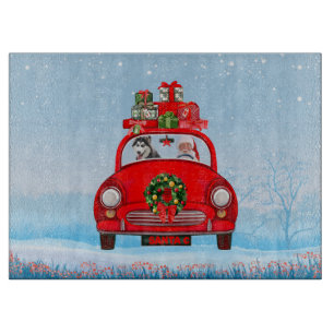 Siberian Husky Dog In Car With Santa Claus Cutting Board