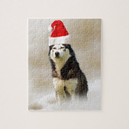 Siberian Husky Dog with Santa Hat in Snow Jigsaw Puzzle