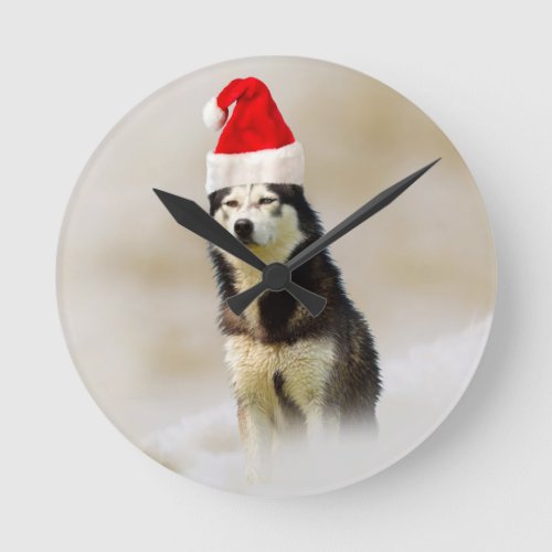 Siberian Husky Dog with Santa Hat in Snow Round Clock