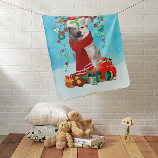 siberian husky in snow with Christmas gifts  Baby Blanket (In Situ)