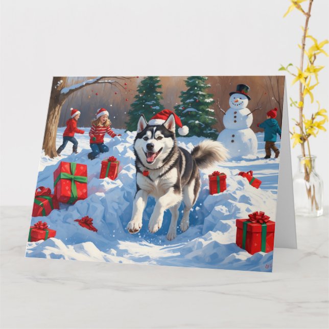 Siberian Husky Running in Snow with Christmas Hat Card (Yellow Flower)