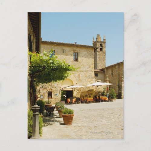 Sidewalk cafe beside a church Romanesque Postcard