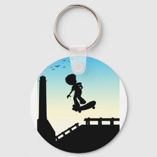 Silhouette boy skateboarding on the street keychain