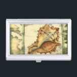 Silhouette Conch Shell Case For Business Cards<br><div class="desc">Stay relaxed with this piece of contemporary art by Jennifer Goldberger. Her collection of seashell art is relaxing and inspirational. This piece of art focuses on a large Conch seashell surrounded by green coral reef. Get this beautiful ocean art today with a silhouette feel on your next product.</div>