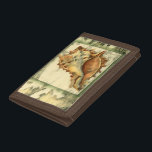 Silhouette Conch Shell Trifold Wallet<br><div class="desc">Stay relaxed with this piece of contemporary art by Jennifer Goldberger. Her collection of seashell art is relaxing and inspirational. This piece of art focuses on a large Conch seashell surrounded by green coral reef. Get this beautiful ocean art today with a silhouette feel on your next product.</div>