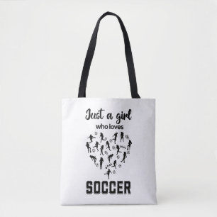Silhouette girls playing Soccer Tote Bag