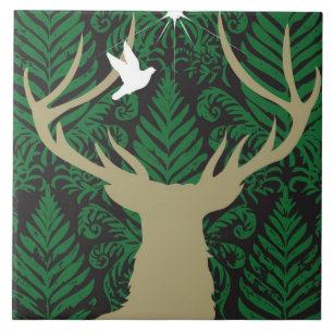 Silhouette of a deer, a dove and a star against a tile