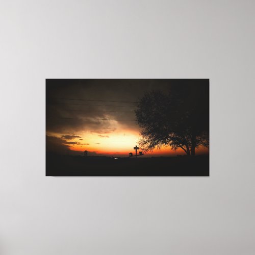 Silhouette of a Tree at Sunset Canvas Print