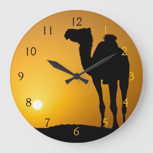 Silhouette of a wild camel at sunset large clock