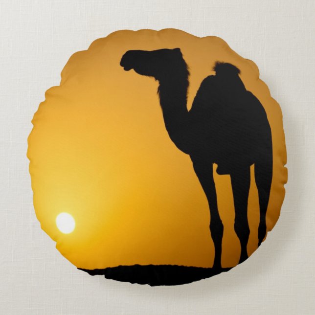 Silhouette of a wild camel at sunset round pillow (Front)