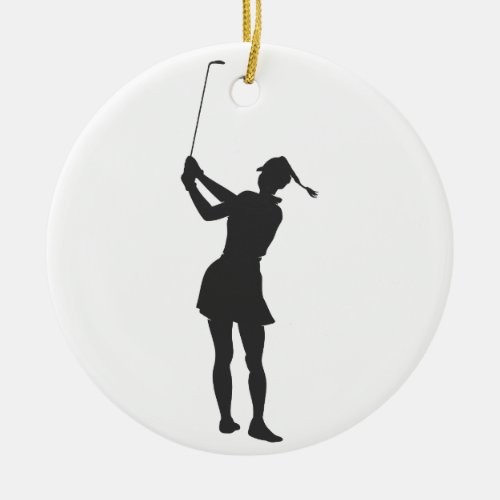 Silhouette of a woman playing golf ceramic ornament