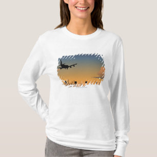 Silhouette of an airplane in flight T-Shirt