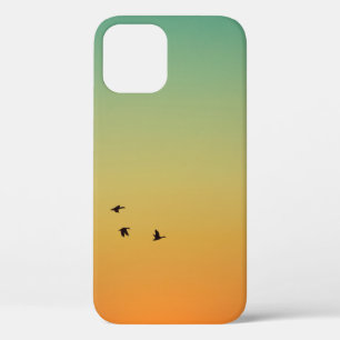 SILHOUETTE OF BIRDS FLYING DURING SUNSET iPhone 12 CASE