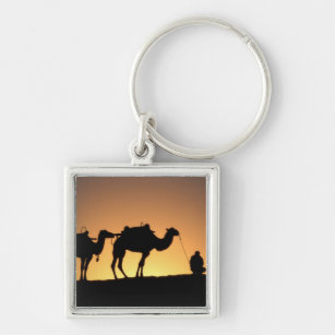 Silhouette of camel caravan on the desert at 2 keychain