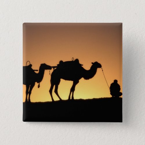 Silhouette of camel caravan on the desert at 2 pinback button