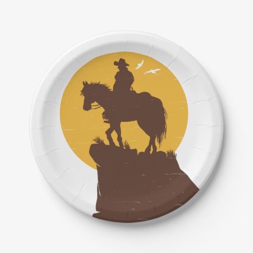 Silhouette of cowboy riding horse at sunset paper plates