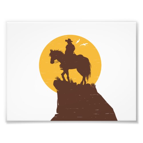 Silhouette of cowboy riding horse at sunset photo print